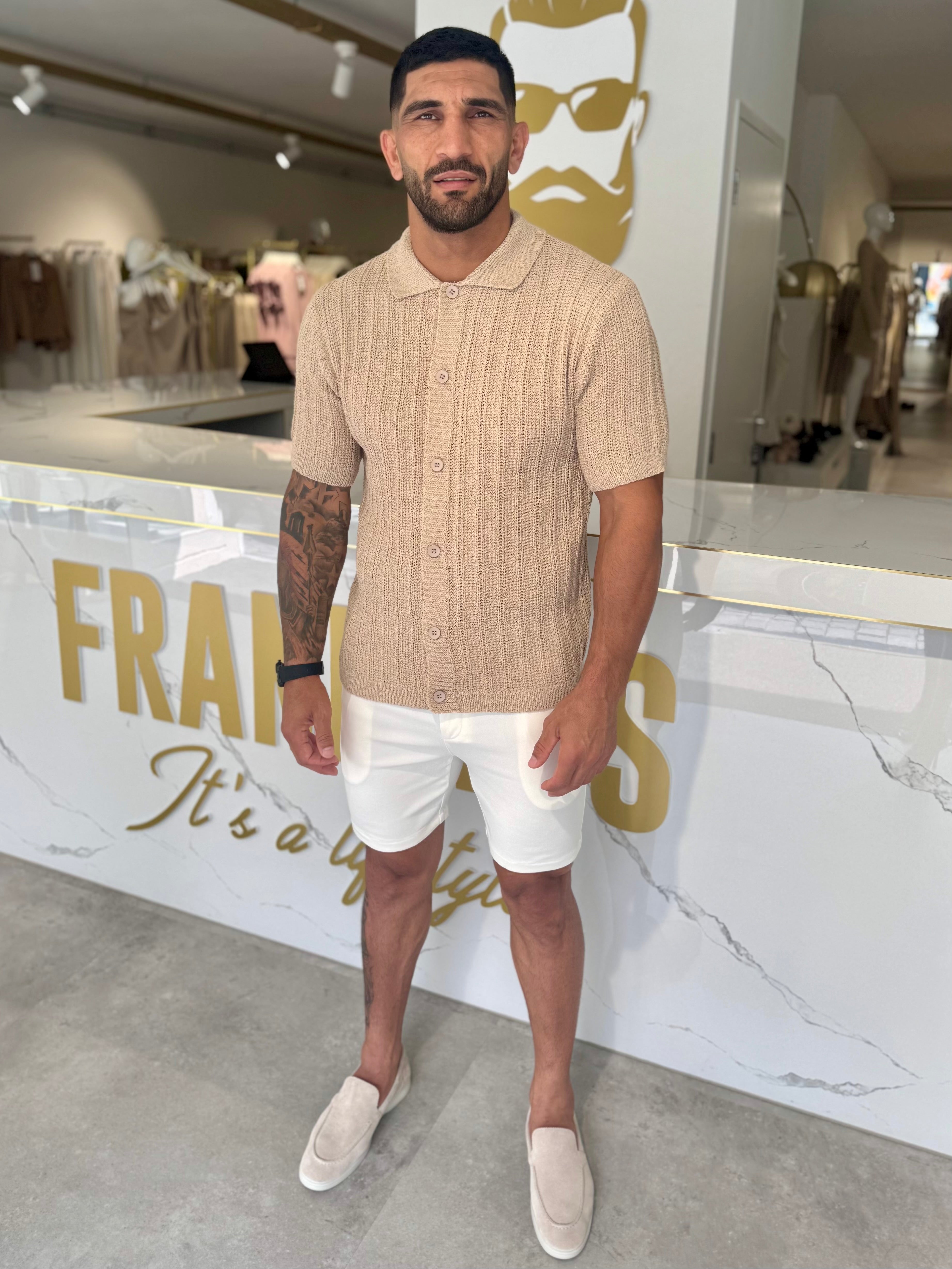 Buttoned knitted shirt beige