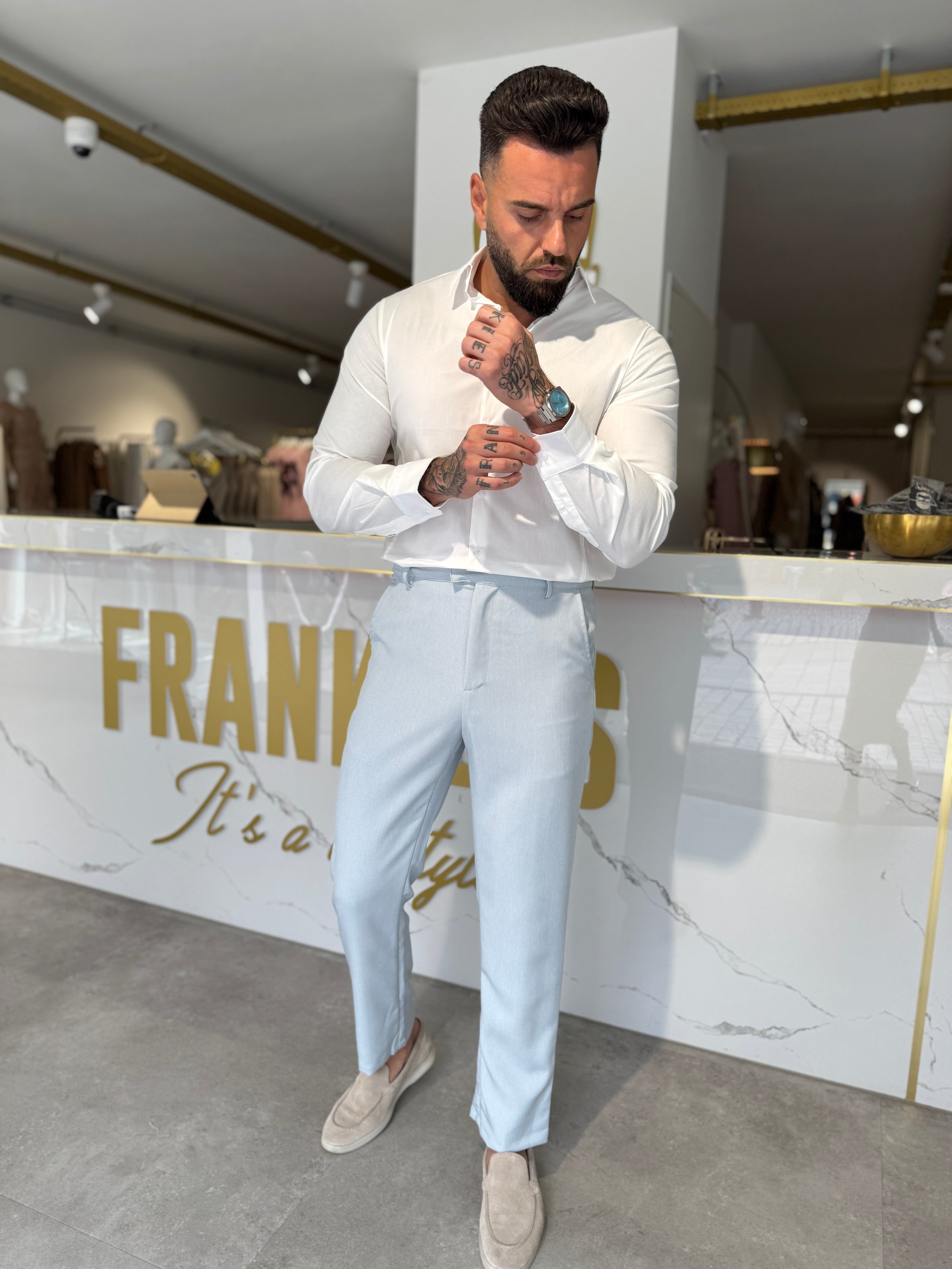 Pantalon straight fit shifted button light blue